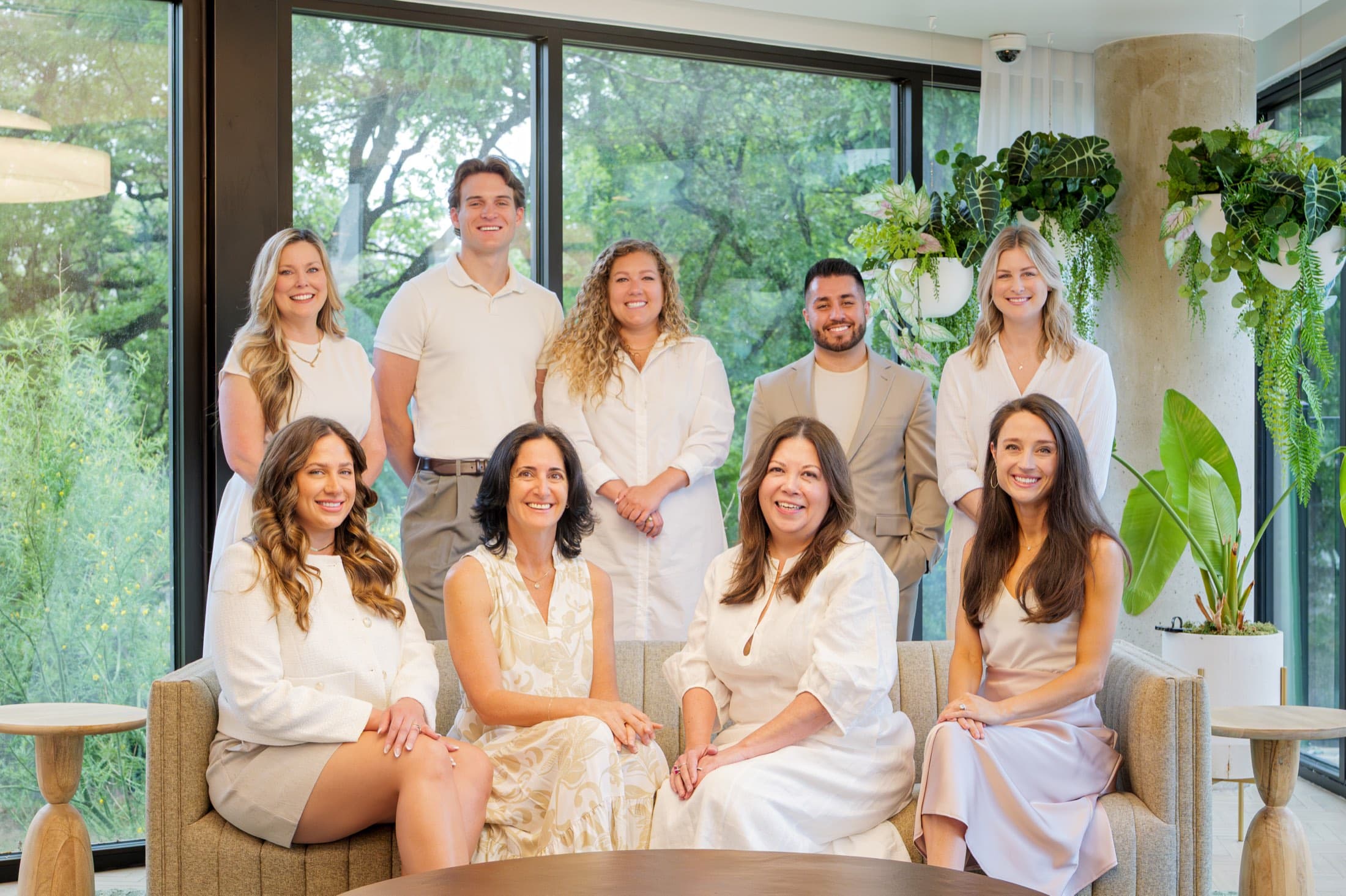 The Krew team together in a bright Austin office lounge